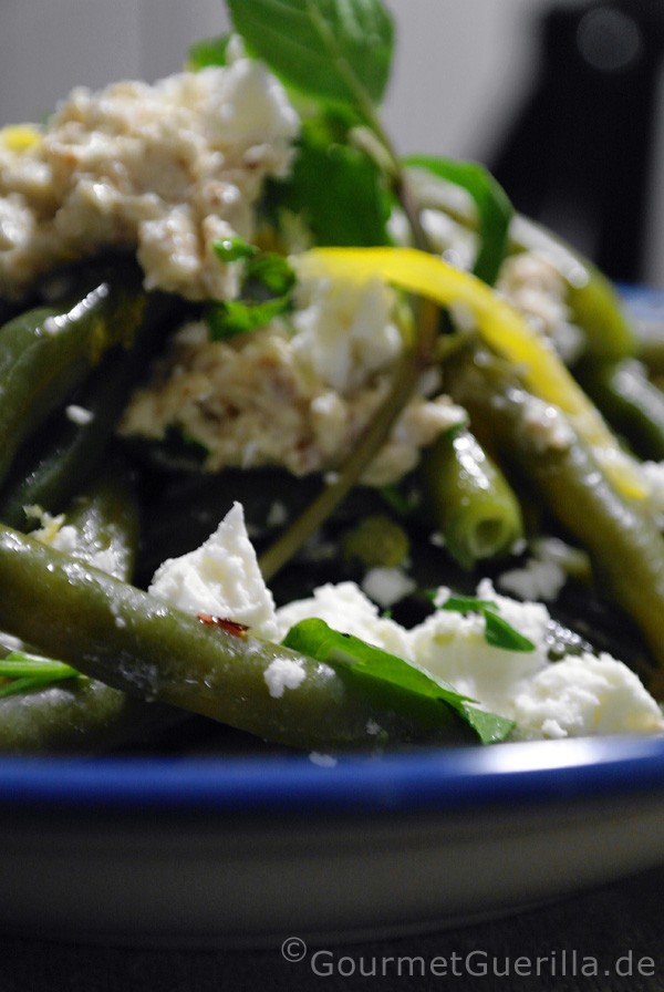 Green beans with feta cheese, chili and white almond sauce