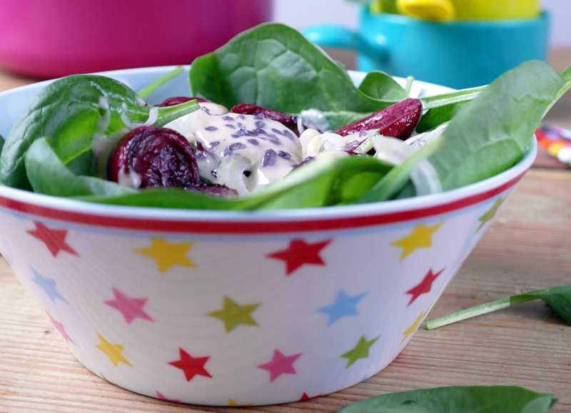 An active rabbi and spinach salad with baby eggplant and sesame dressing
